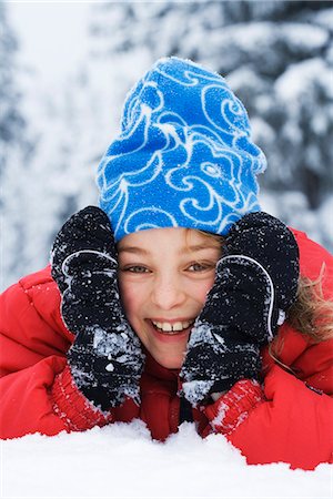 simsearch:6102-03827802,k - A girl playing in the snow, Sweden. Stock Photo - Premium Royalty-Free, Code: 6102-03866426