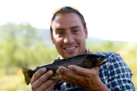 simsearch:6102-03867416,k - A man with a fish, Sweden. Stock Photo - Premium Royalty-Free, Code: 6102-03866566