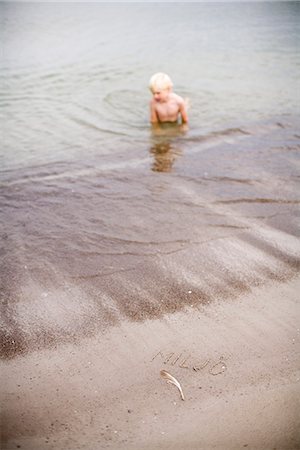 A boy bathing in the sea, Gotland, Sweden. Foto de stock - Sin royalties Premium, Código: 6102-03866569