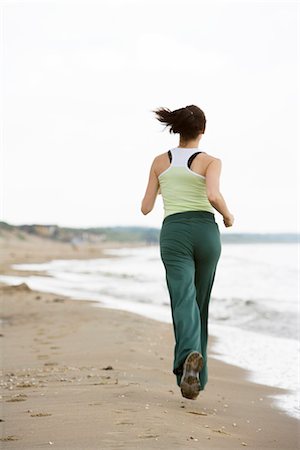 simsearch:6102-03866522,k - Eine Frau, jogging, Skane, Schweden. Stockbilder - Premium RF Lizenzfrei, Bildnummer: 6102-03866516