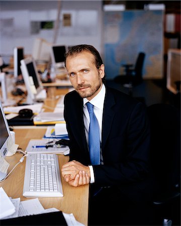 simsearch:6102-03859327,k - A man in an office, Sweden. Stock Photo - Premium Royalty-Free, Code: 6102-03866737