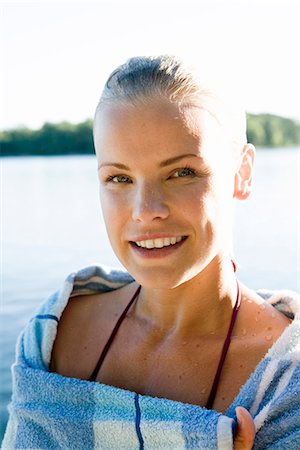 A woman by the sea in the archipelago of Stockholm, Sweden. Stock Photo - Premium Royalty-Free, Code: 6102-03866879