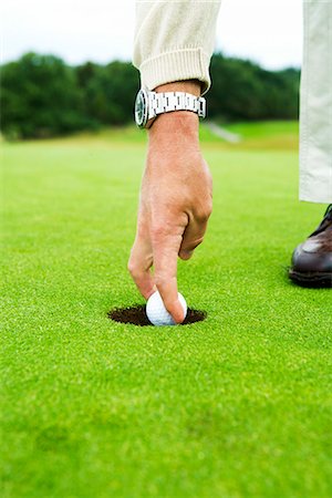 simsearch:6102-03827785,k - La main d'un homme jouant au golf, Suède. Photographie de stock - Premium Libres de Droits, Code: 6102-03867216