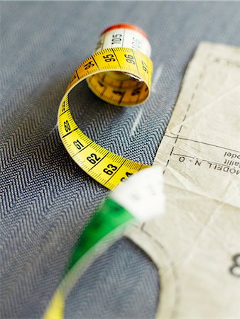 sewing pattern - Measuring-tape and a pattern, Sweden. Stock Photo - Premium Royalty-Free, Code: 6102-03867340