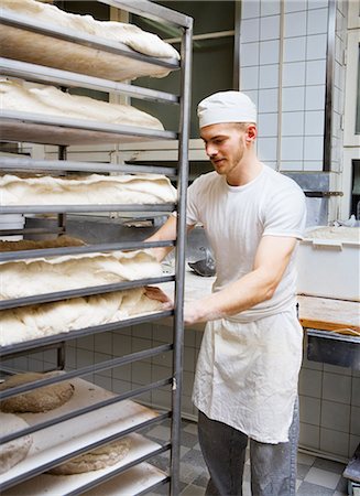 A baker in a bakery, Sweden. Stock Photo - Premium Royalty-Free, Code: 6102-03867373