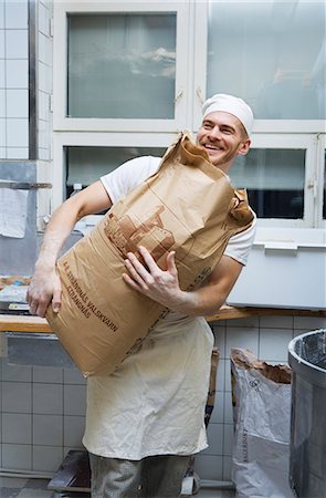 A baker in a bakery, Sweden. Stock Photo - Premium Royalty-Free, Code: 6102-03867383