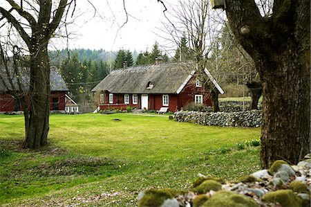 A red barn in the south of Sweden. Foto de stock - Sin royalties Premium, Código: 6102-03826741