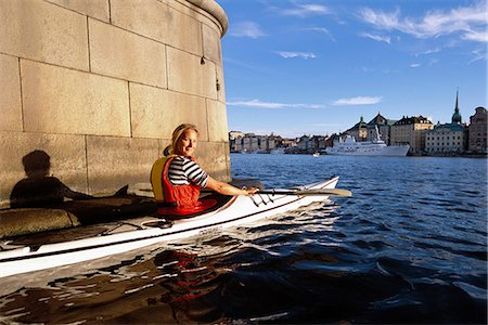 simsearch:6102-08062949,k - Woman canoeing in Stockholm, Sweden. Stock Photo - Premium Royalty-Free, Code: 6102-03826714