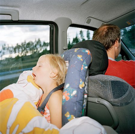 Girl sleeping in a car safety-seat, Stockholm, Sweden. Foto de stock - Sin royalties Premium, Código: 6102-03826734