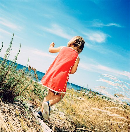 simsearch:6102-03828809,k - Girl on her way to the beach, Oland, Sweden. Stock Photo - Premium Royalty-Free, Code: 6102-03826882