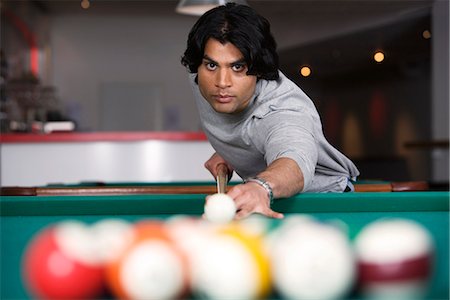 A man playing pool. Foto de stock - Sin royalties Premium, Código: 6102-03827147