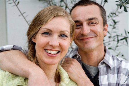 simsearch:6102-03828555,k - Porträt eines lächelnden Paares. Stockbilder - Premium RF Lizenzfrei, Bildnummer: 6102-03827243