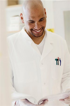 A male researcher in a laboratory, Sweden. Stock Photo - Premium Royalty-Free, Code: 6102-03827282