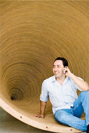 A man talking in a cellphone. Stock Photo - Premium Royalty-Free, Code: 6102-03827326