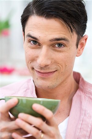 A man holding a a cup of tea, Sweden. Stock Photo - Premium Royalty-Free, Code: 6102-03827887