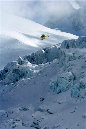 Rescue helicopter in Mer de Glace, Chamonix, France. Stock Photo - Premium Royalty-Free, Code: 6102-03828187