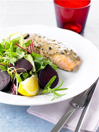 salmon fish for dinner - Salmon and a salad. Stock Photo - Premium Royalty-Free, Code: 6102-03828225