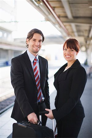 Two business people on a train station, Stockholm, Sweden. Stock Photo - Premium Royalty-Free, Code: 6102-03828665