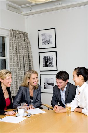 simsearch:6102-06026005,k - Four people sitting at a table, Sweden. Stock Photo - Premium Royalty-Free, Code: 6102-03903920