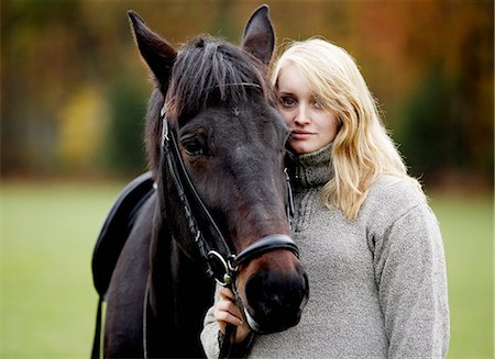 A woman and a horse, Sweden. Stock Photo - Premium Royalty-Free, Code: 6102-03903939