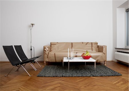 Furniture that has been wrapped up in a living room, Sweden. Stock Photo - Premium Royalty-Free, Code: 6102-03904008