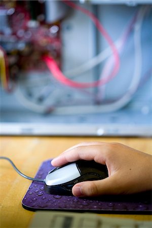 A child's hand on a computer mouse, Sweden. Stock Photo - Premium Royalty-Free, Code: 6102-03904022