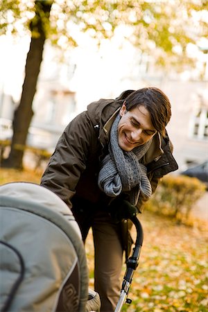 stroller - Father and preambulator, Sweden. Stock Photo - Premium Royalty-Free, Code: 6102-03904193