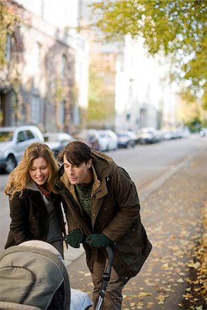 family walk anxious - A couple taking a walk with their baby, Sweden. Stock Photo - Premium Royalty-Free, Code: 6102-03904197