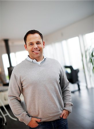 simsearch:6102-03905315,k - Portrait of a smiling man, Sweden. Foto de stock - Sin royalties Premium, Código: 6102-03904121