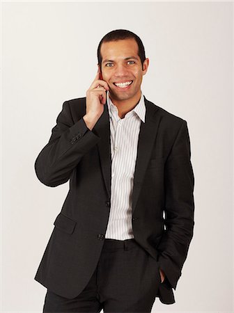simsearch:6102-03859327,k - Businessman using his mobile phone, Sweden. Stock Photo - Premium Royalty-Free, Code: 6102-03904135
