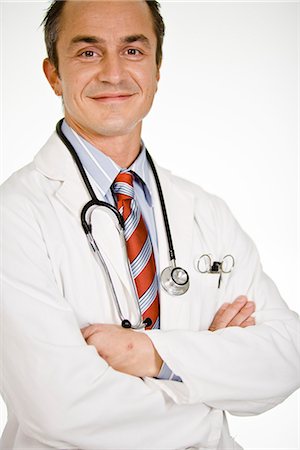 simsearch:6102-03905315,k - Portrait of a male doctor, Sweden. Foto de stock - Sin royalties Premium, Código: 6102-03904289