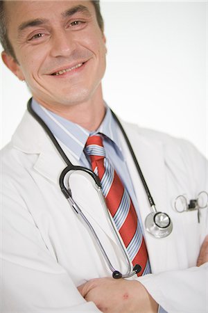 simsearch:6102-03905315,k - Portrait of a male doctor, Sweden. Foto de stock - Sin royalties Premium, Código: 6102-03904290