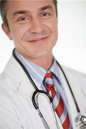 simsearch:6102-03905315,k - Portrait of a male doctor, Sweden. Foto de stock - Sin royalties Premium, Código: 6102-03904291