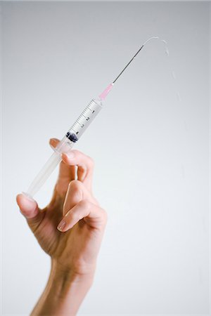 Nurse injecting, close-up. Stock Photo - Premium Royalty-Free, Code: 6102-03904299