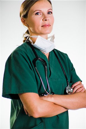 A doctor wearing a green uniform. Stock Photo - Premium Royalty-Free, Code: 6102-03904317