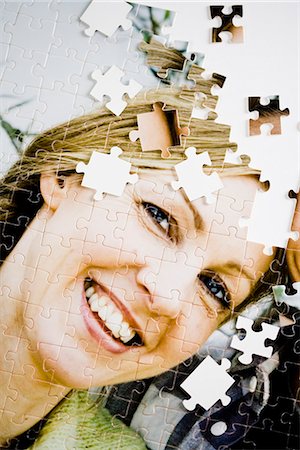 disappearing - A puzzle with the image of a couple. Stock Photo - Premium Royalty-Free, Code: 6102-03904438