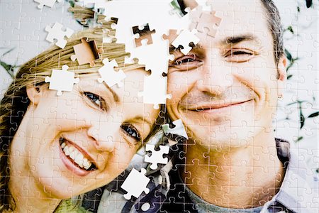 puzzle piece - A puzzle with the image of a couple. Foto de stock - Sin royalties Premium, Código: 6102-03904439