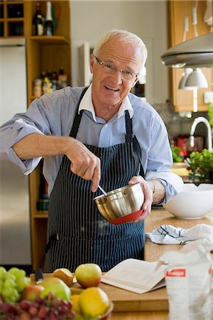 simsearch:6102-06777551,k - Senior man cooking, Sweden. Stock Photo - Premium Royalty-Free, Code: 6102-03904686