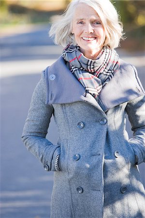 simsearch:6102-03904745,k - Portrait of a senior woman taking a walk, Sweden. Foto de stock - Sin royalties Premium, Código: 6102-03904725