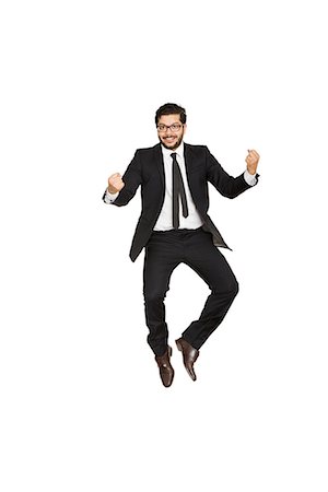 Businessman jumping of joy. Stock Photo - Premium Royalty-Free, Code: 6102-03904880