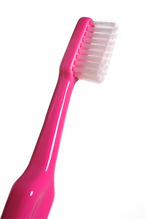 Pink toothbrush, close-up. Foto de stock - Sin royalties Premium, Código: 6102-03905181