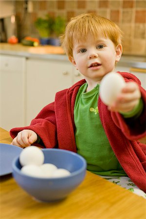 A little boy having breakfast, Sweden. Stock Photo - Premium Royalty-Free, Code: 6102-03905243