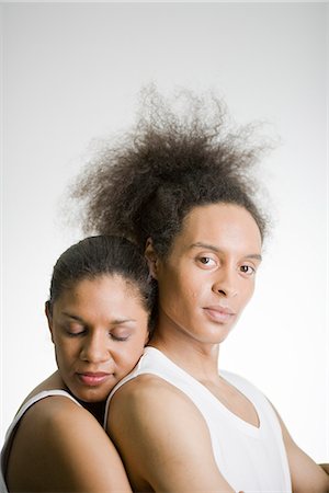 front profile portrait eyes closed studio - Portrait of a tender couple. Stock Photo - Premium Royalty-Free, Code: 6102-03905272