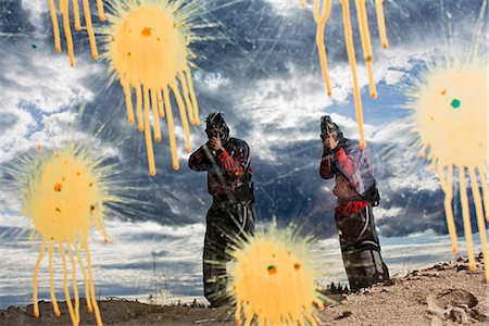 stain spot - Men playing paintball, Sweden. Stock Photo - Premium Royalty-Free, Code: 6102-03905669