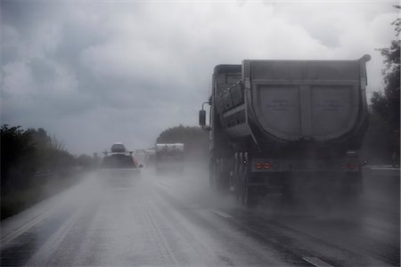 Rain weather on highway Stock Photo - Premium Royalty-Free, Code: 6102-03905687