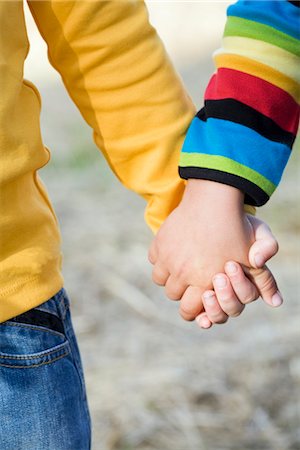 friendships with boys and girls hand - Friends holding hands Stock Photo - Premium Royalty-Free, Code: 6102-03905861