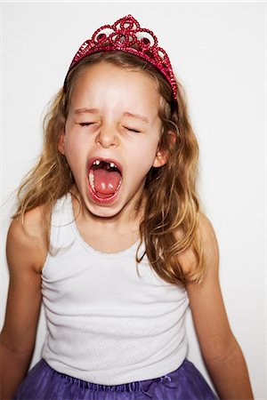 denmark children - Angry girl in fancy dress costume screaming Stock Photo - Premium Royalty-Free, Code: 6102-03906016