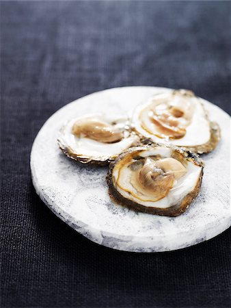 simsearch:6102-03828260,k - Close-up of oyster Stock Photo - Premium Royalty-Free, Code: 6102-04929326