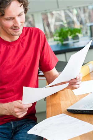 simsearch:6102-04929446,k - Mid section of man working from home Stock Photo - Premium Royalty-Free, Code: 6102-04929515