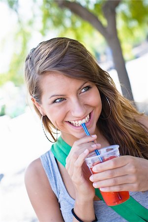 simsearch:6102-04929804,k - Portrait of teenage girl drinking from cup, outdoors Stock Photo - Premium Royalty-Free, Code: 6102-04929805